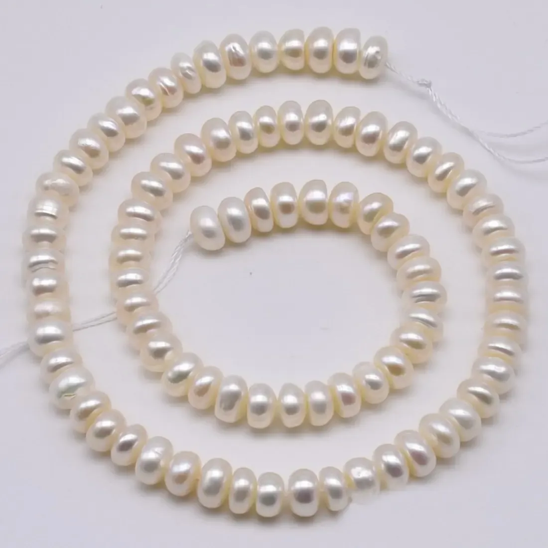 Off-white rice imitation pearl bead strand 6 x 4 mm, 16 inch
